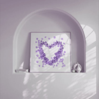 Video showing framed art print of Purple Floral Heart - a delicate painting by Susan Marie Williams of a heart shape composed of purple flowers - in a light alcove with gently moving shadows